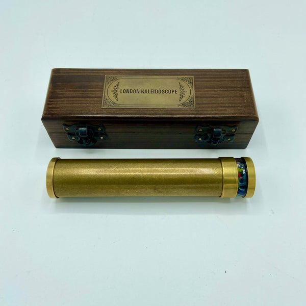 Brass 6" Oil Turning Kaleidoscope in a special wooden box.