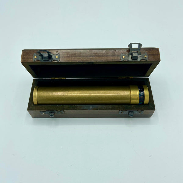 Brass 6" Oil Turning Kaleidoscope in a special wooden box.